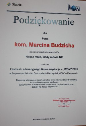 dyplom - podziękowanie dla Naczelnika Wydziału Prewencji KMP Katowice, w górnym lewym rogu logo województwa śląskiego a prawym rogu logo WOM