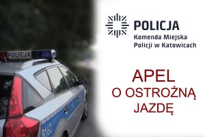 po lewej widać bok radiowozu, po prawej widać logo Policji, i napis Komenda Miejska Policji w Katowicach, aple o ostrożną jazdę.