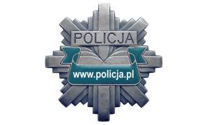 zdjęcie kolorowe: policyjna odznaka