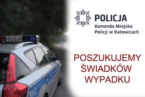 zdjęcie kolorowe: policyjny radiowóz i napis Komenda Miejska Policji w Katowicach - poszukujemy świadków wypadku drogowego