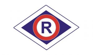 Kolorowa grafika: znak ruchu drogowego litera R w kole wpisana w romb