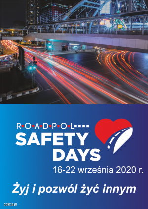 zdjęcie kolorowe: plakat promujący ROAD SAFETY DAYS (Dni bezpieczeństwa ruchu drogowego), ulica miasta nocą z rozmytymi światłami samochodów