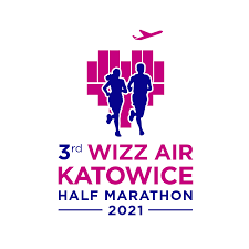 zdjęcie kolorowe: grafika przedstawiających kobietę i mężczyznę, którzy biegną i napis 3rd Wizz Air Katowice Half Marathon