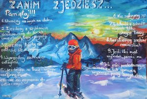 zdjęcie kolorowe: nagrodzona praca konkursowa przedstawiająca młodego narciarza na tle góry