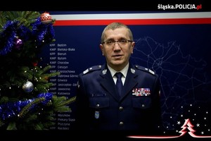 Zdjęcie kolorowe: przedstawiające nadinspektora Romana Rabsztyna Komendanta Wojewódzkiego Policji w Katowicach, składającego życzenia świąteczne