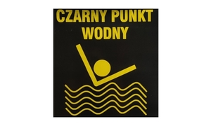 zdjęcie kolorowe: grafika ostrzegająca przed :czarny punkt - utonęcia